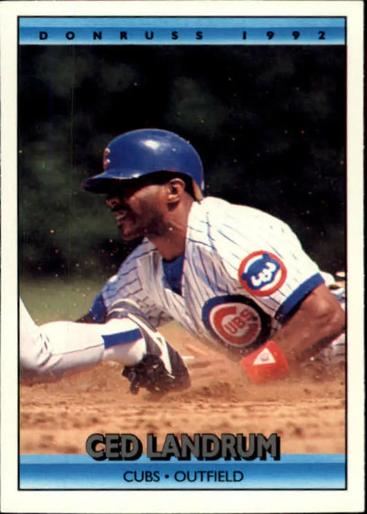 Ced Landrum sliding into base, featured on a Chicago Cubs baseball card