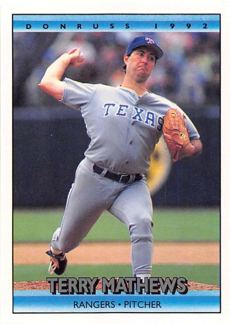 1992 Donruss Terry Mathews Texas Rangers baseball card with pitcher mid-throw in gray uniform