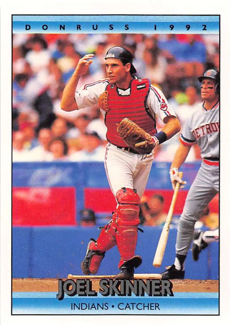 Baseball card of Joel Skinner in red uniform for Cleveland Indians, throwing from home plate