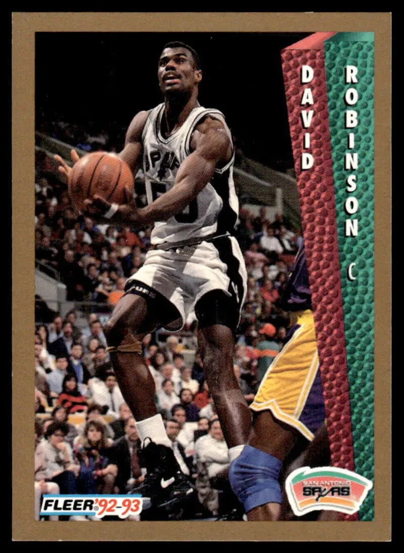 David Robinson in San Antonio Spurs uniform shooting during 1992 Fleer basketball card