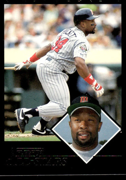 Minnesota Twins Kirby Puckett baseball card in batting stance with inset headshot