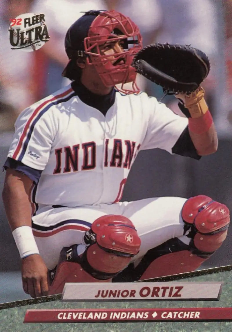 Cleveland Indians baseball card of Junior Ortiz catching in action during a game