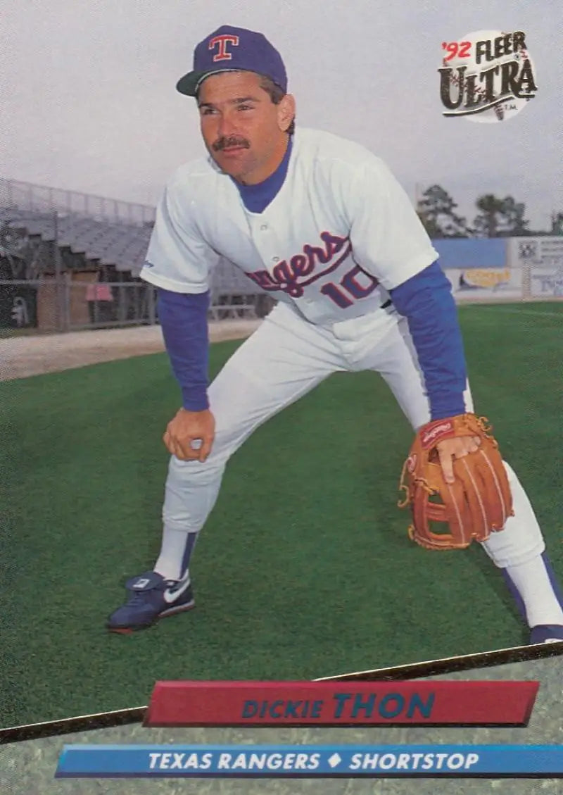 Baseball player Dickie Thon in Texas Rangers uniform fielding stance on Fleer Ultra card