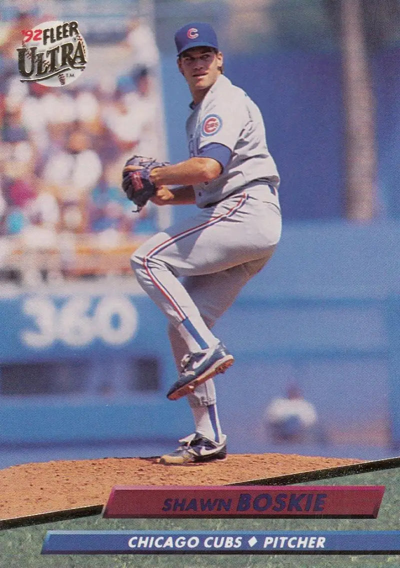 Chicago Cubs baseball card of Shawn Boskie pitching in gray road uniform on mound