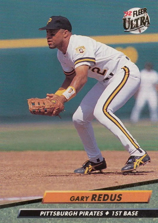 Pittsburgh Pirates baseball player Gary Redus fielding at first base on a card