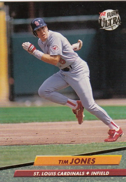 Baseball player Tim Jones running the base path in gray Cardinals uniform baseball card