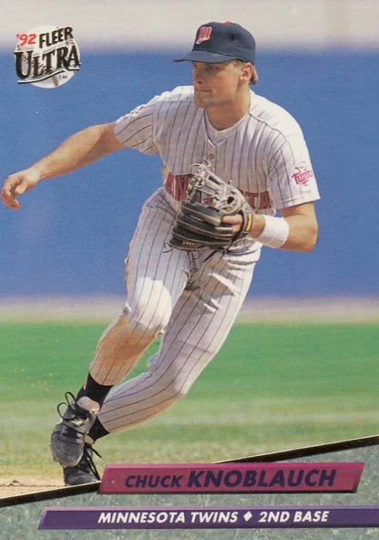 Chuck Knoblauch fielding at second base in a Minnesota Twins pinstriped uniform on a Fleer Ultra Baseball Card