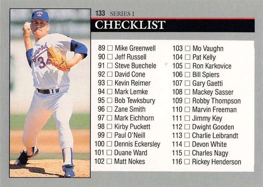 Nolan Ryan in a Texas Rangers uniform mid-pitching for a baseball card display