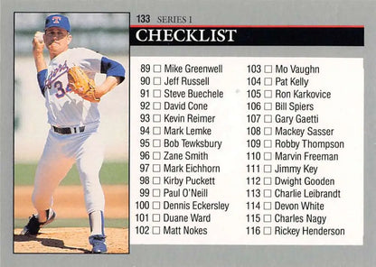 Nolan Ryan in a Texas Rangers uniform mid-pitching for a baseball card display