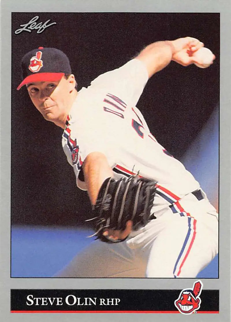 Baseball pitcher Steve Olin in action wearing Cleveland Indians uniform mid-delivery