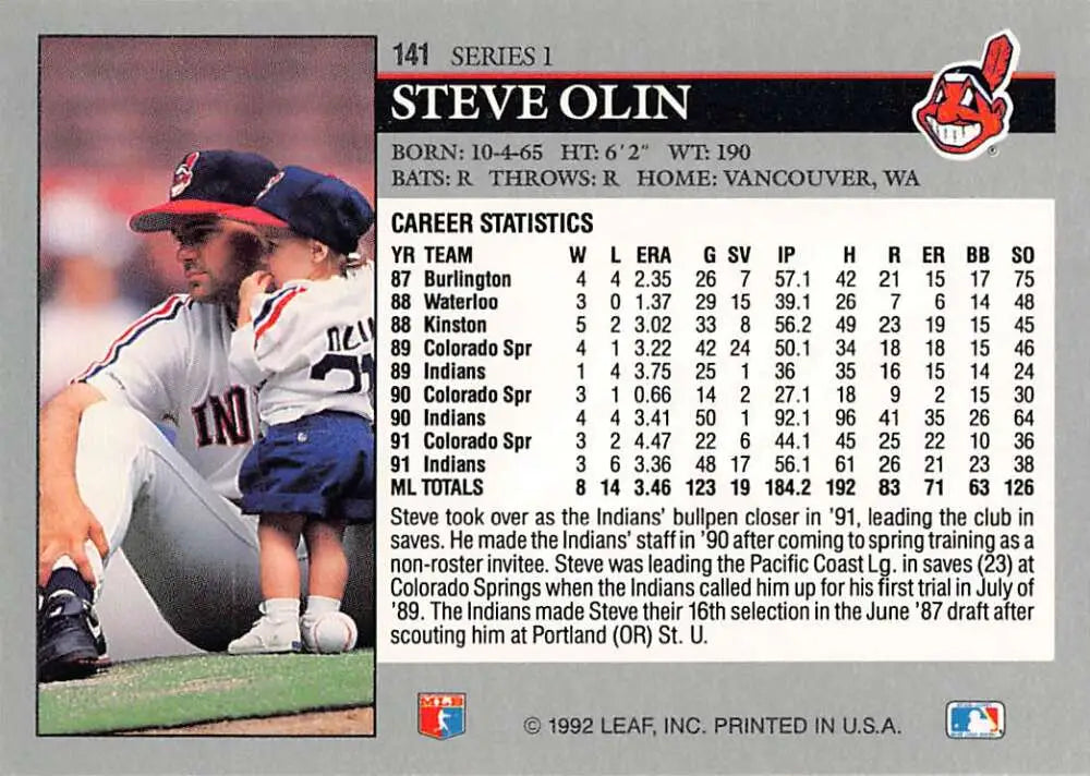 Baseball card of Steve Olin sliding into base for the Cleveland Indians baseball team