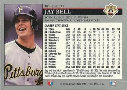 Jay Bell smiling on a 1992 Leaf Pittsburgh Pirates Baseball Card with black cap