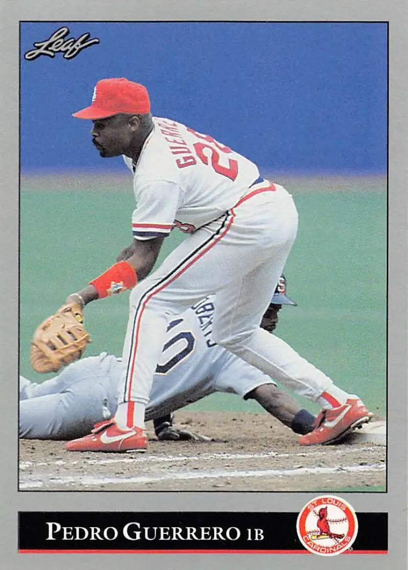 Baseball card of Pedro Guerrero fielding for the St. Louis Cardinals in white uniform