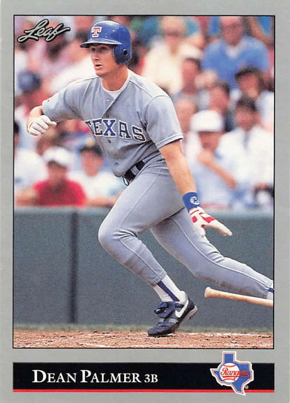 Dean Palmer in Texas Rangers road uniform swinging on 1992 Leaf baseball card