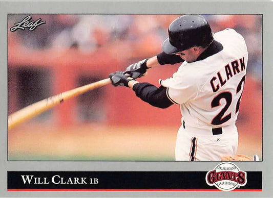 Baseball player in white San Francisco Giants uniform swinging bat on baseball card