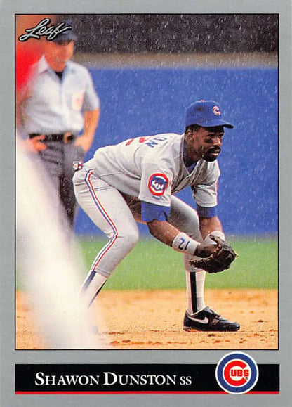 Shawon Dunston in a Chicago Cubs uniform fielding on 1992 Leaf baseball card