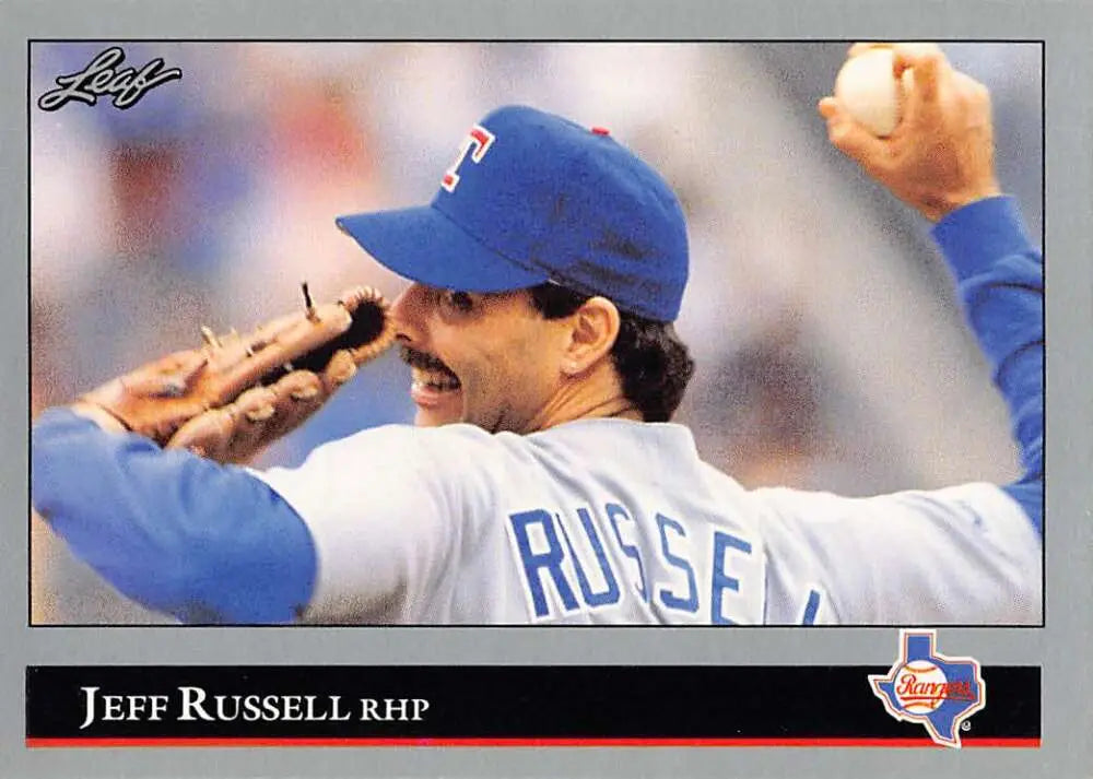 Jeff Russell celebrating with raised arms in Texas Rangers uniform baseball card image