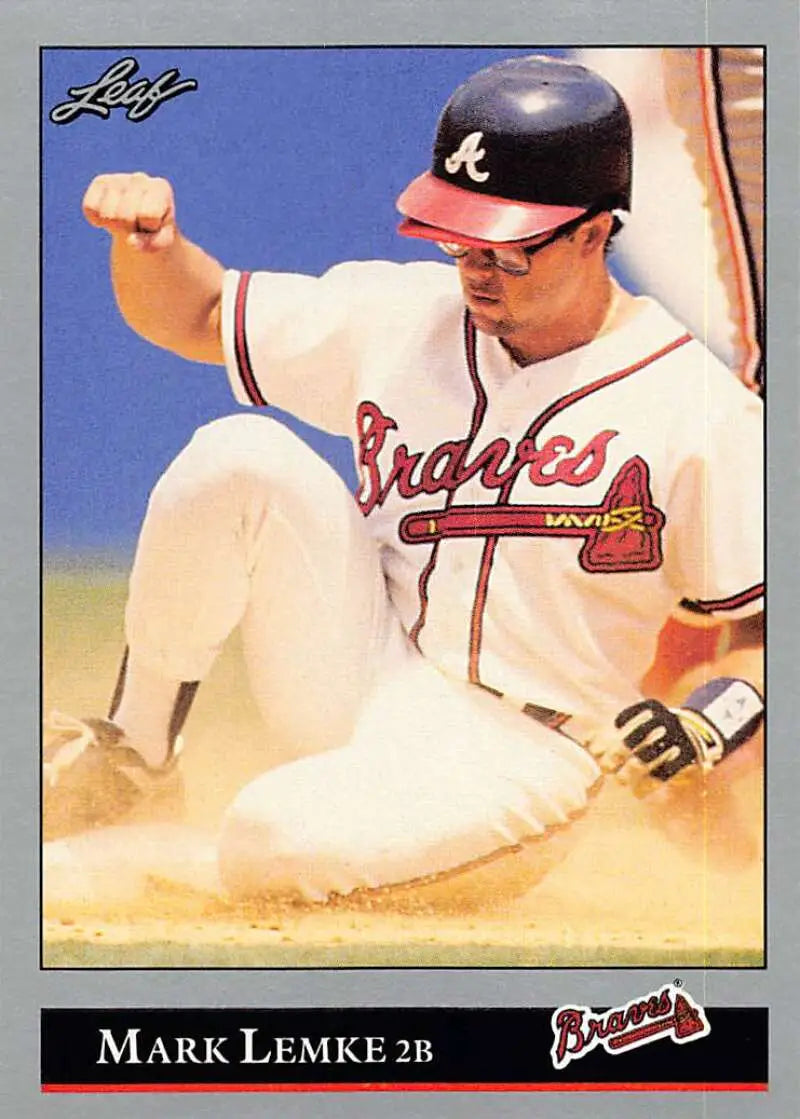 Mark Lemke sliding into base in Atlanta Braves uniform, featured on Baseball Card