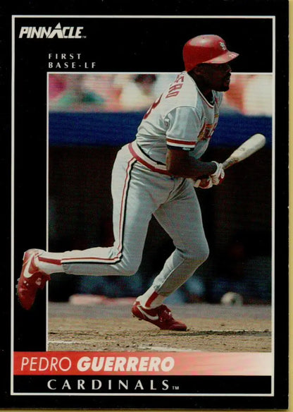 Baseball card of Pedro Guerrero in a white and red St. Louis Cardinals uniform