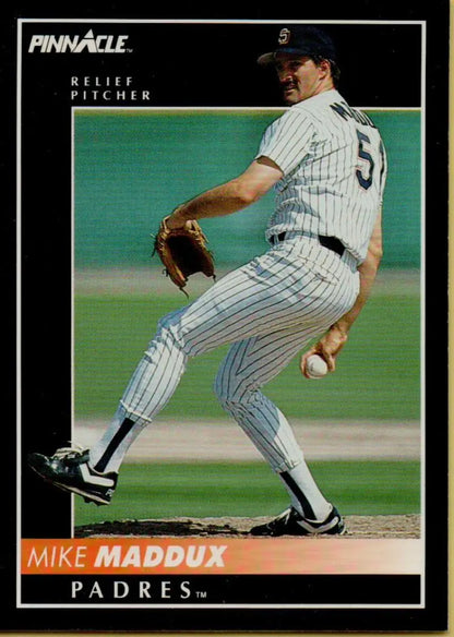 Baseball pitcher Mike Maddux in San Diego Padres uniform delivering a pitch