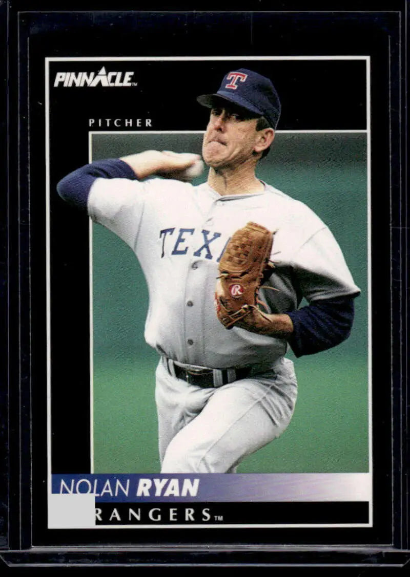 Texas Rangers baseball card of Nolan Ryan in mid-throwing motion wearing white uniform