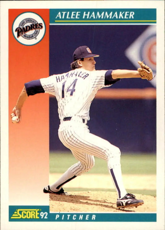 Atlee Hammaker delivering a pitch in pinstriped uniform for San Diego Padres