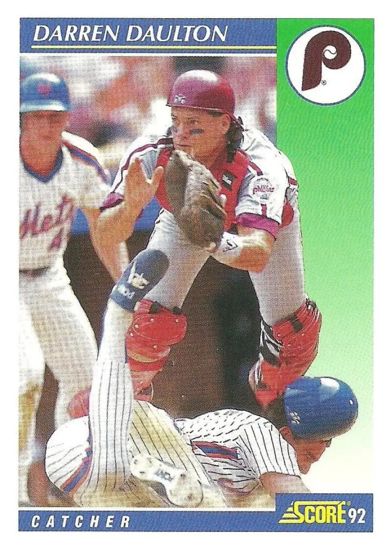 Darren Daulton catching at home plate on a 1992 Score Philadelphia Phillies baseball card