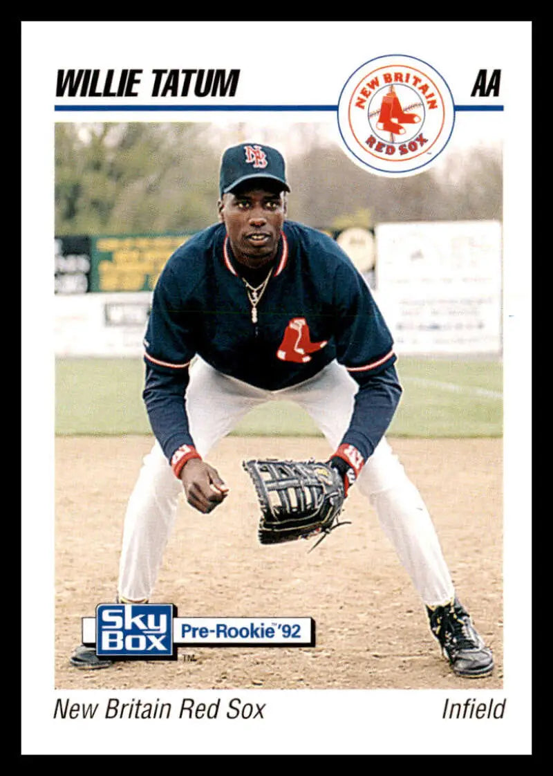 Baseball player in a Red Sox uniform fielding for the Britain Red Sox team