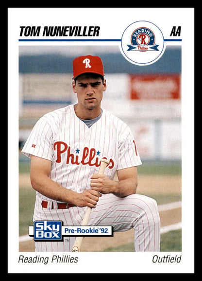 Tom Nuneviller Reading Phillies baseball card with pinstriped uniform and red cap