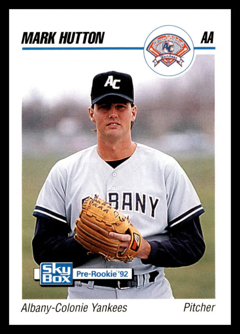 Baseball card of Mark Hutton, Albany-Colonie Yankees pitcher in white uniform with glove