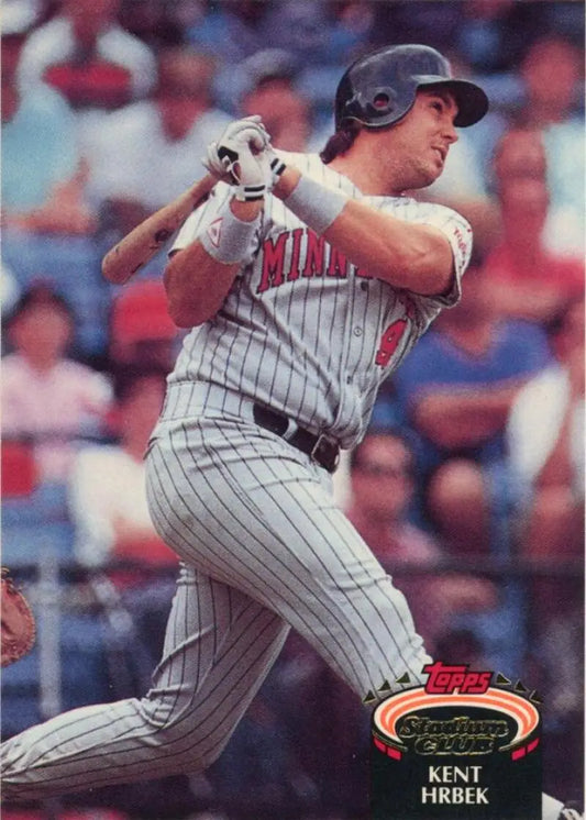 Kent Hrbek swinging a bat in Minnesota Twins pinstriped uniform on a Topps Stadium Club card