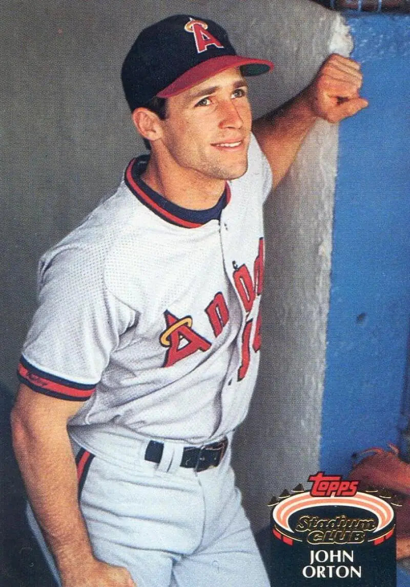 John Orton in Anaheim Angels uniform leaning against wall for California Angels baseball card