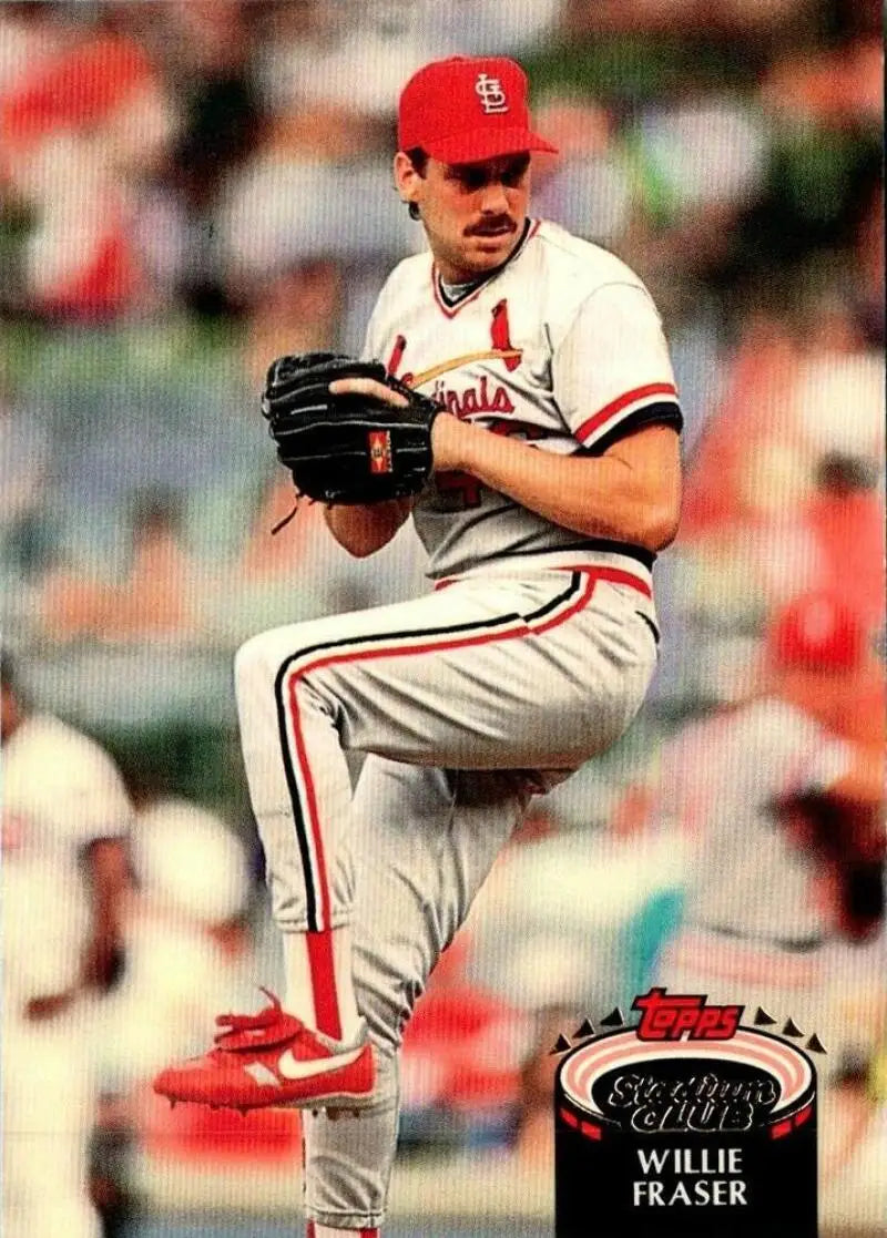 Willie Fraser in red cap and white uniform, St. Louis Cardinals pitcher in windup