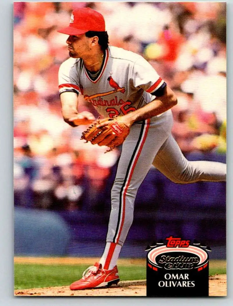 Baseball player Omar Olivares pitching in Baltimore Orioles uniform for Topps Stadium Club