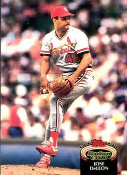 St. Louis Cardinals pitcher Jose DeLeon delivering a pitch in classic uniform