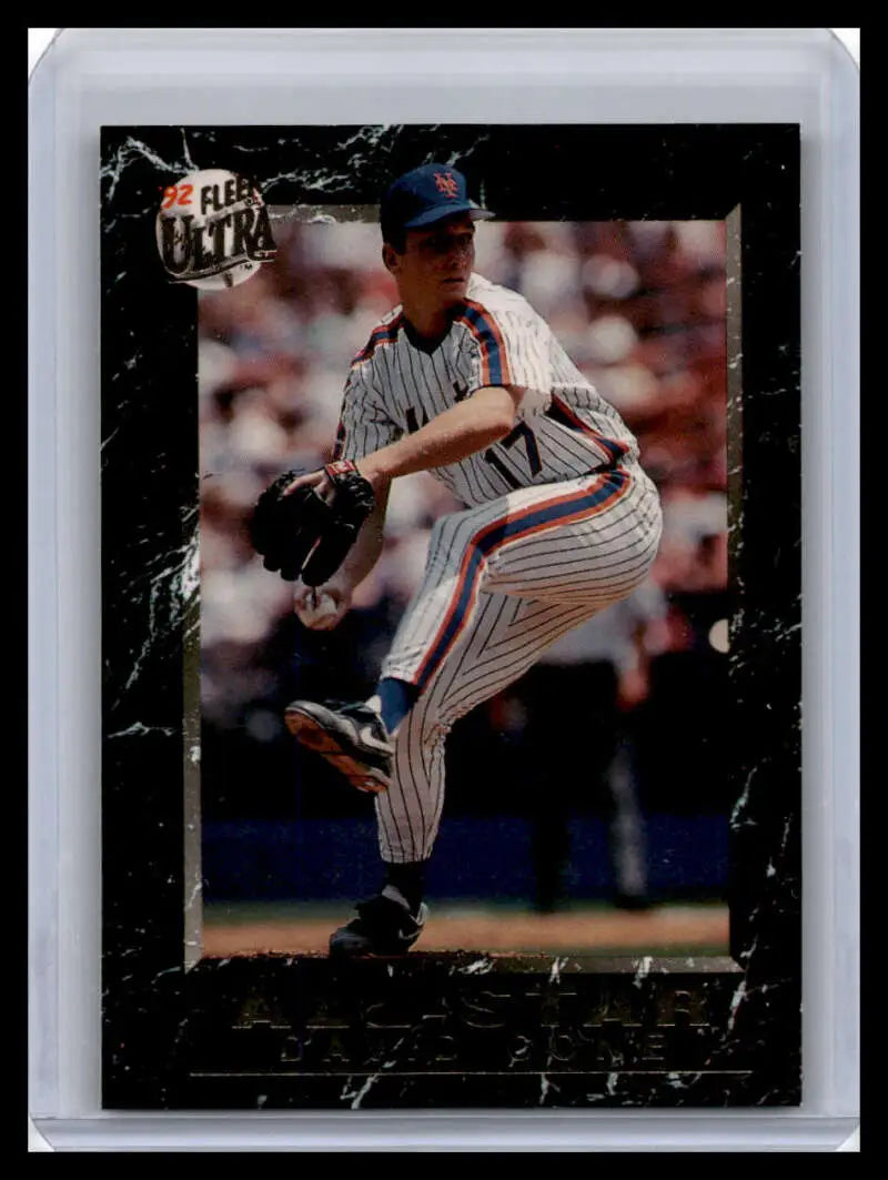 Baseball player David Cone in New York Mets pinstripe uniform mid-pitch on card