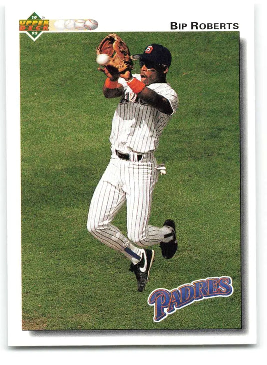 Baseball card of Bip Roberts in pinstriped San Diego Padres uniform catching a ball