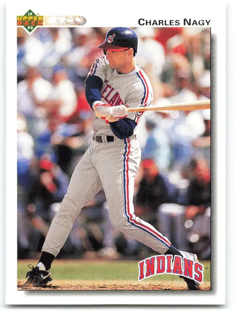 Baseball card of Charles Nagy in gray Cleveland Indians uniform at bat