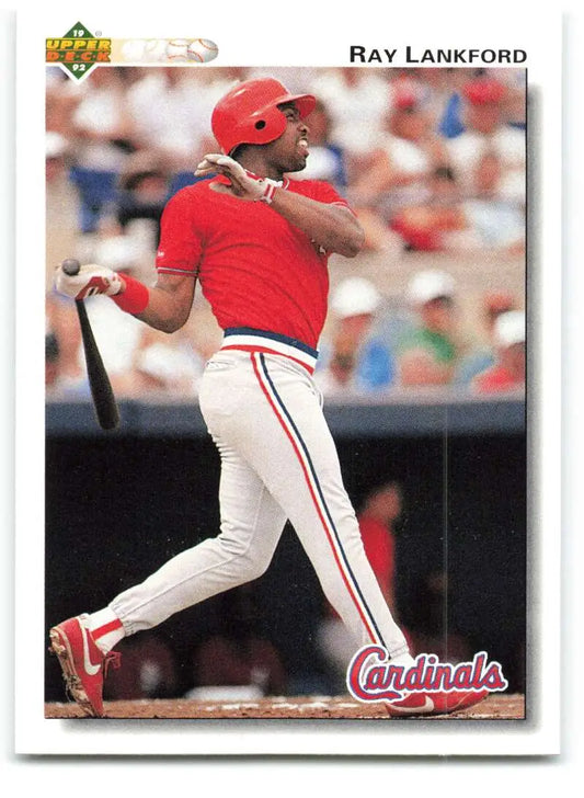 Ray Lankford mid-swing in red jersey, featured on Upper Deck baseball card 1992