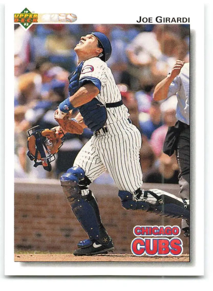 Chicago Cubs player Joe Girardi catching a ball in pinstriped uniform for baseball card