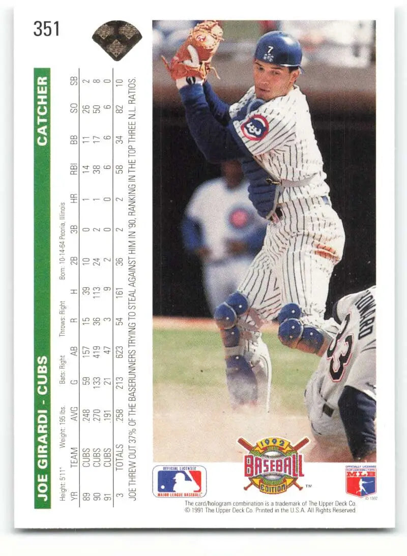 Baseball card of Joe Girardi in a pinstriped uniform for Chicago Cubs catching a ball