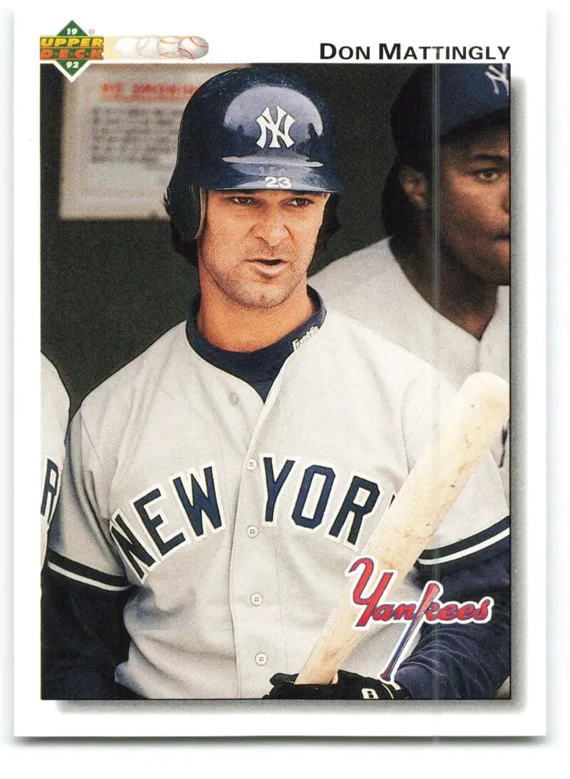 Don Mattingly baseball card featuring New York Yankees player in pinstriped uniform