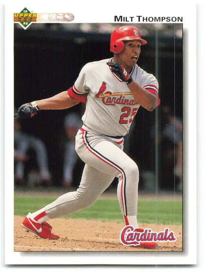 Baseball card featuring Milt Thompson swinging a bat in St. Louis Cardinals uniform