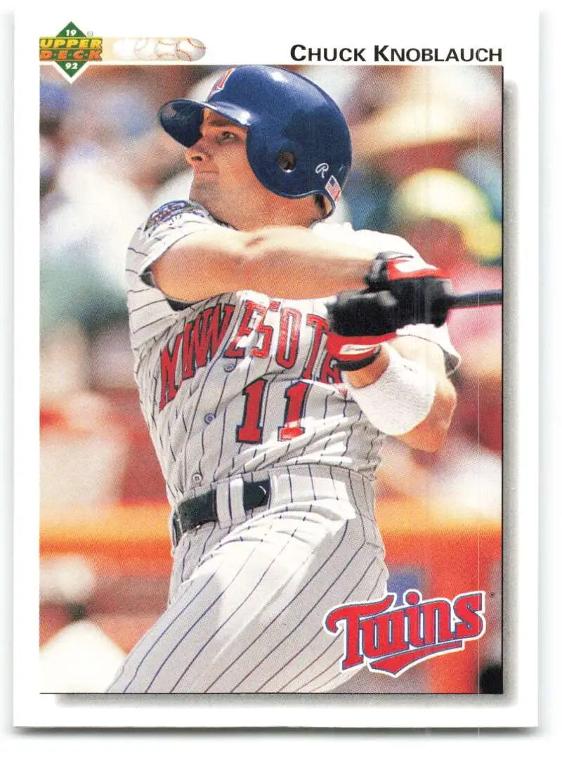 Chuck Knoblauch Minnesota Twins baseball card in white pinstriped uniform at bat