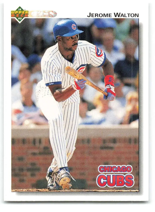 Baseball card of Jerome Walton in a Chicago Cubs pinstriped uniform at bat