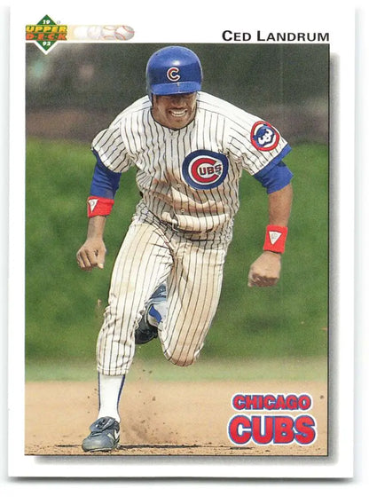 Chicago Cubs Ced Landrum baseball card in pinstriped uniform running the bases