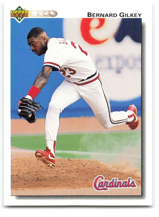 Baseball player in Cardinals uniform pitching, featured in Upper Deck Bernard Gilkey card