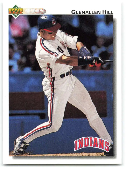 Baseball card of Glenallen Hill swinging for the Cleveland Indians in white uniform