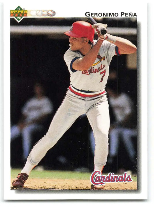 Baseball card of Geronimo Pena in white uniform and red cap for St. Louis Cardinals