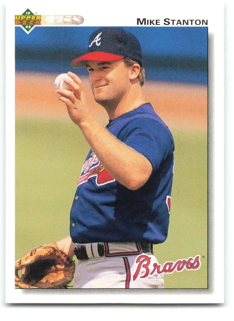 Atlanta Braves baseball card of Mike Stanton in navy blue uniform holding baseball